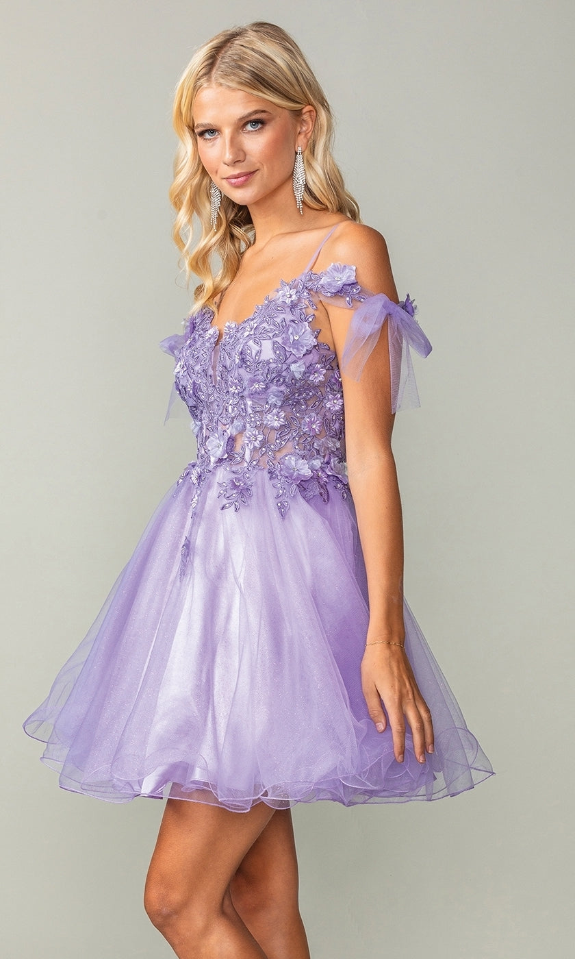 A woman in the Sheer-Corset Short Babydoll Hoco Dress 3339, a short lilac tulle party dress with floral lace appliqué and sheer off-shoulder sleeves, stands against a plain background.